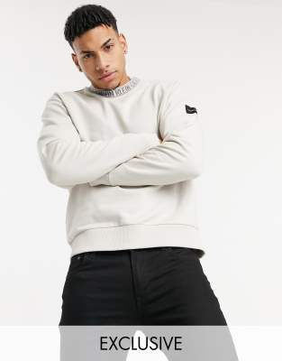 Calvin Klein exclusive to Asos neck logo relaxed fit sweatshirt in stone-Neutral