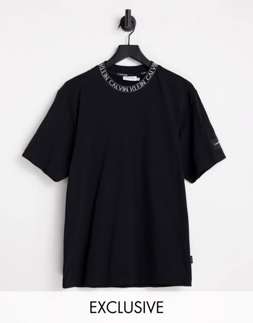 Calvin Klein text reverse chest logo T-shirt in black, ASOS