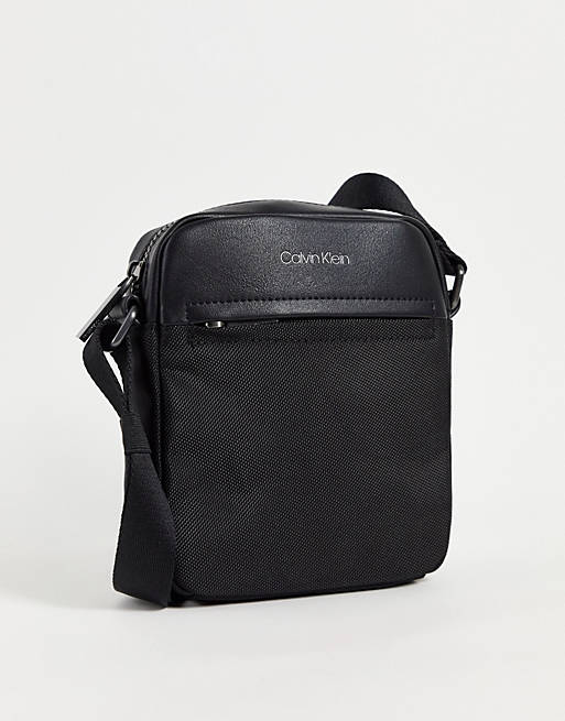 Calvin Klein faux leather reporter with logo in black