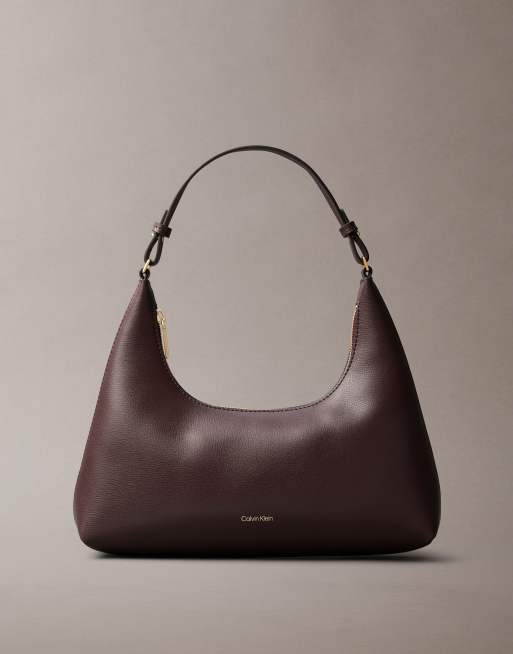 Calvin Klein faux leather shoulder bag in burgundy