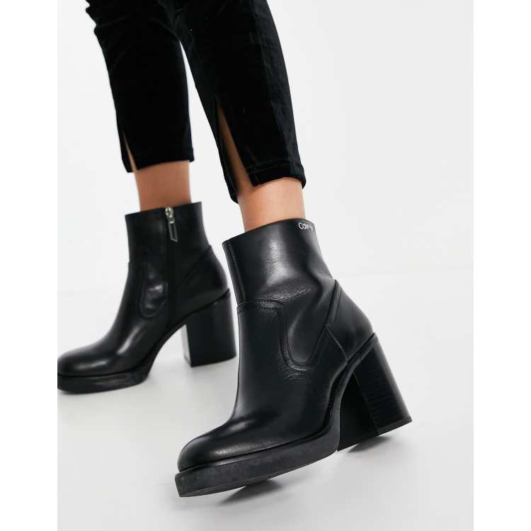 Calvin klein black boots with store gold zipper