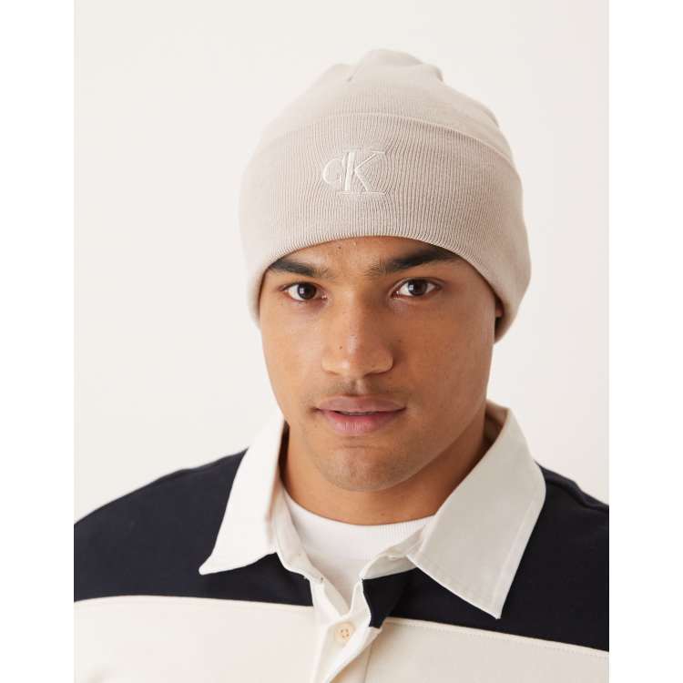 Calvin Klein fine knit logo beanie in beige | ASOS
