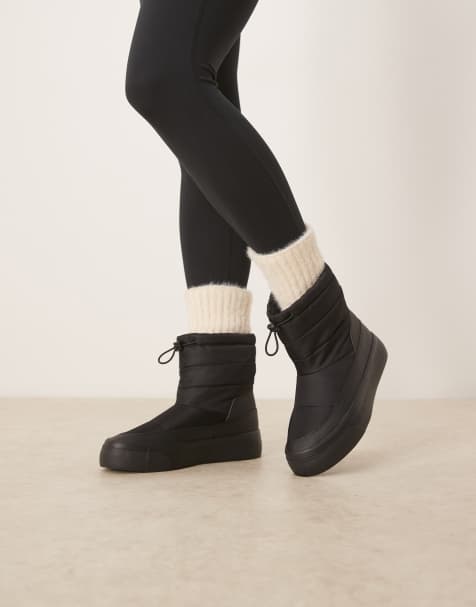 Calvin Klein flatform snow boots in black - view 1