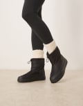 [Calvin Klein] Calvin Klein flatform snow boots in black 36 Triple Black
