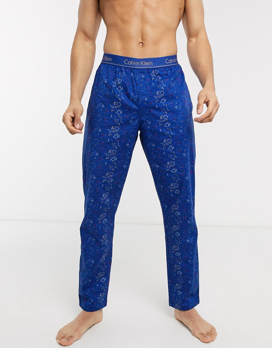 Calvin Klein floral print trousers with logo waistband-Blue