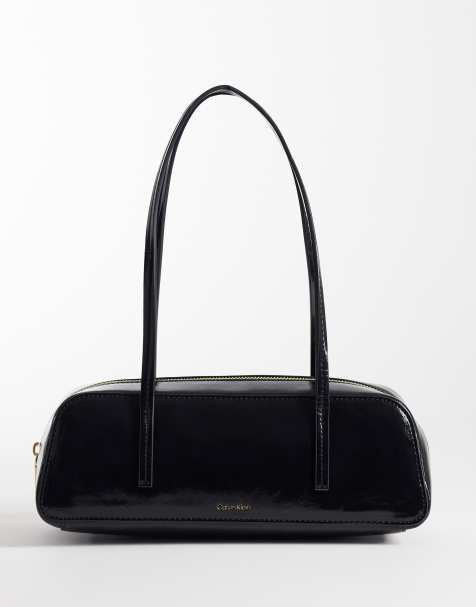 Calvin Klein foil logo glossy Balletto purse in black - view 1