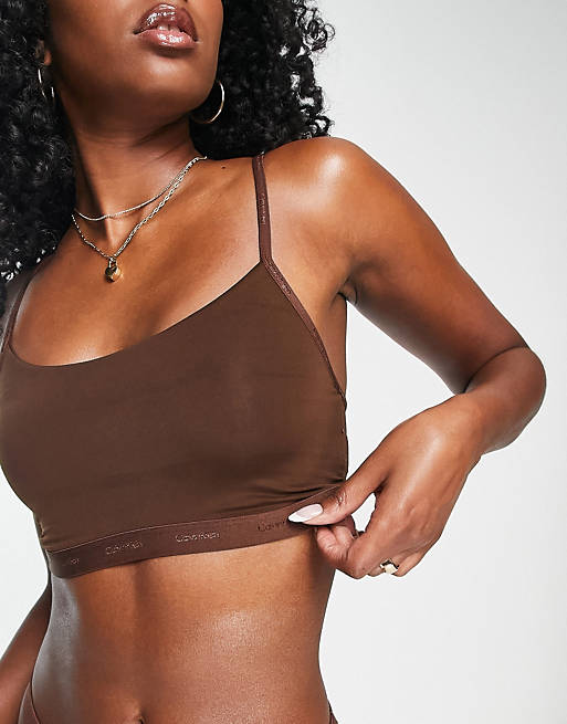 Calvin Klein Form To Body unlined bralette bra with tonal logo in umber |  ASOS