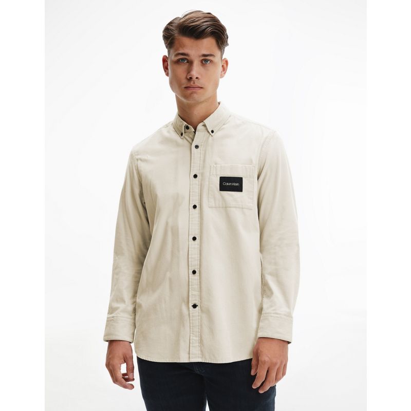 Eml0z Camicie tinta unita Calvin Klein - Giacca regular fit a costine con tasca con logo color pietra