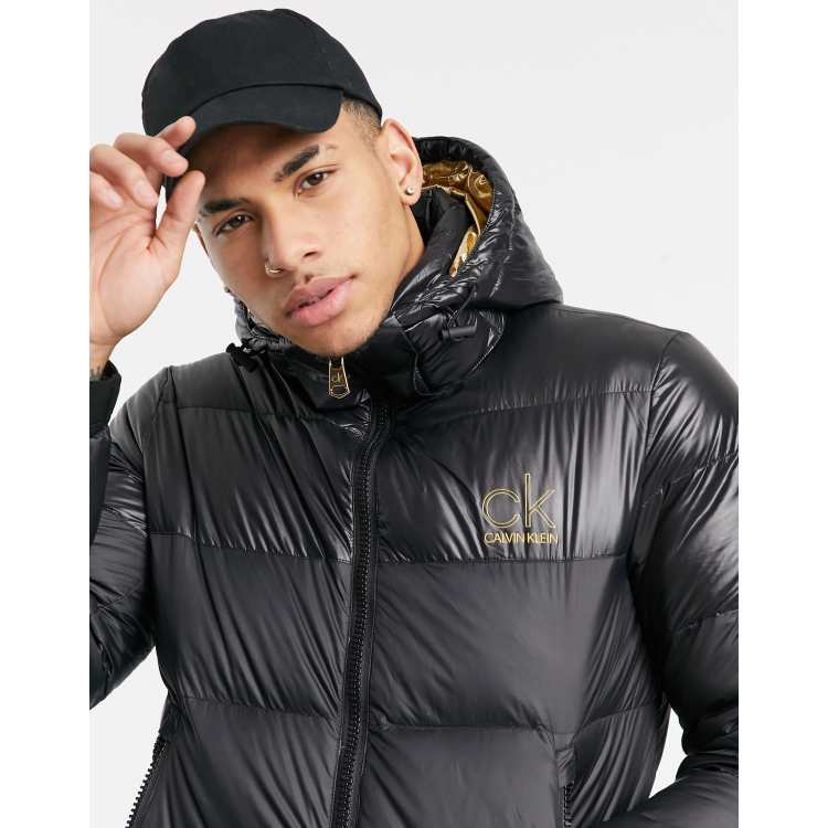 Calvin Klein gold capsule small logo hooded puffer jacket in black