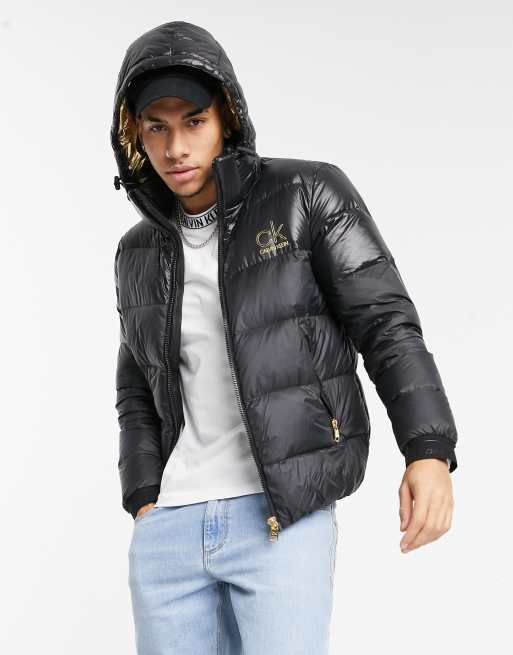 Black and store gold puffer jacket