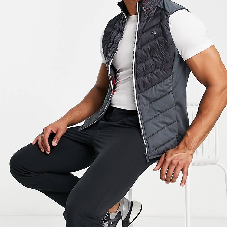 Calvin Klein Golf 17 Mile Drive padded vest in black | ASOS
