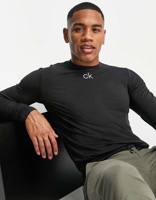 Calvin Klein Golf baselayer long sleeve top with central logo in black ...