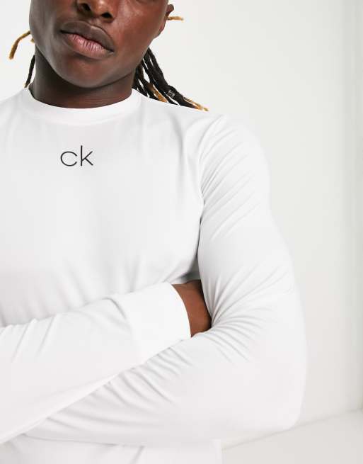 Calvin Klein Golf baselayer long sleeve top with central logo in white |  ASOS