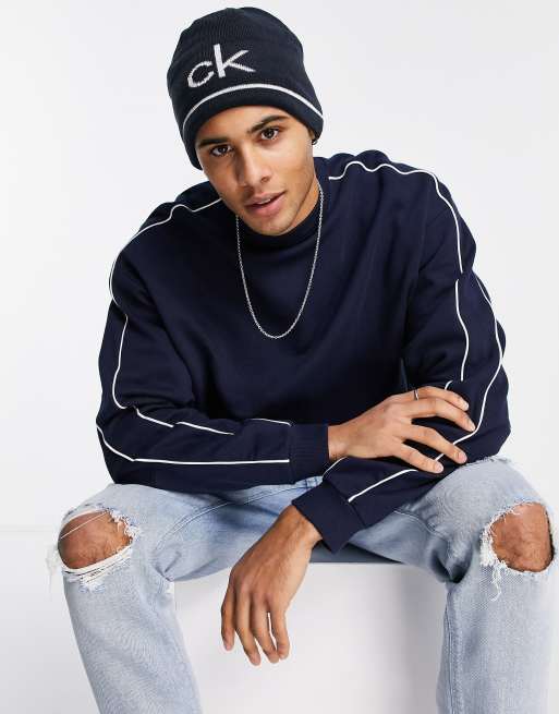 Calvin Klein Golf - Berretto double-face, colore blu navy e bianco