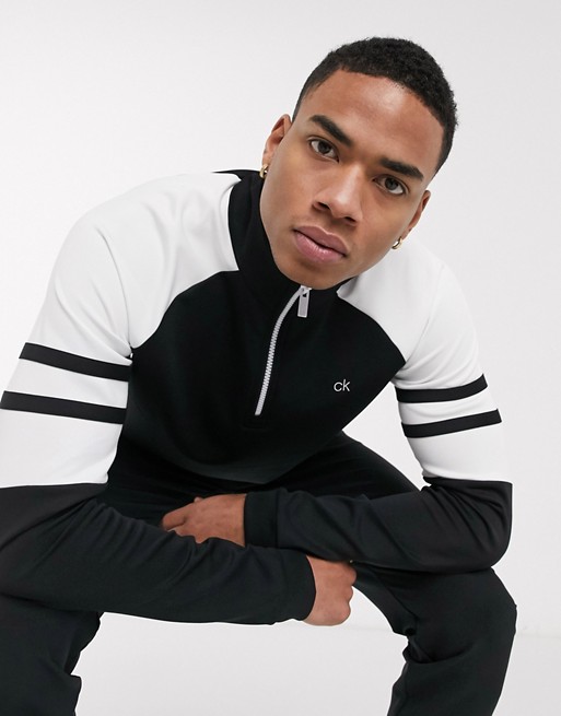 Calvin Klein Golf Flex half-zip with striped sleeves in black