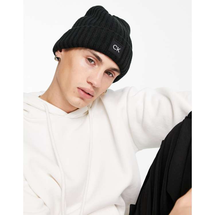 Calvin Klein Golf Losar knitted beanie in black | ASOS