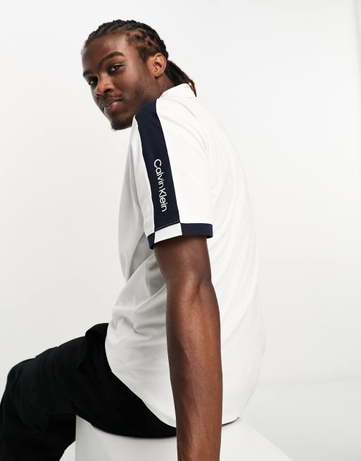 Calvin Klein Golf Miles taped polo shirt in white ASOS