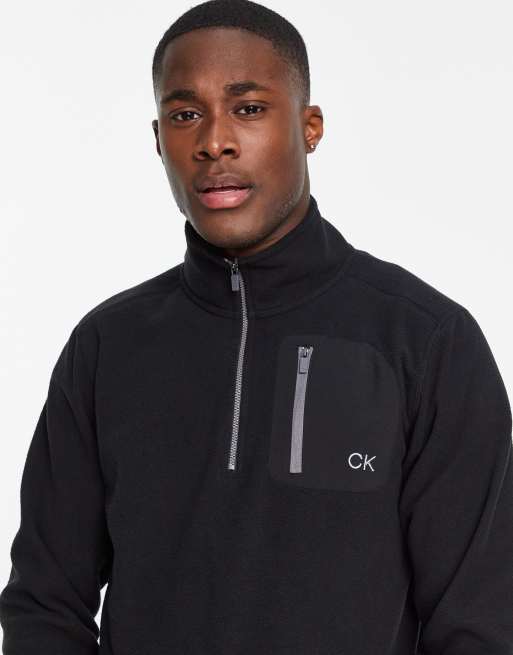 Calvin Klein Golf Planet 1 4 zip fleece top with patch pocket in