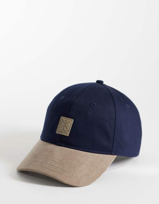 Calvin Klein - Gorra azul oscuro y beis con diseño color block variado