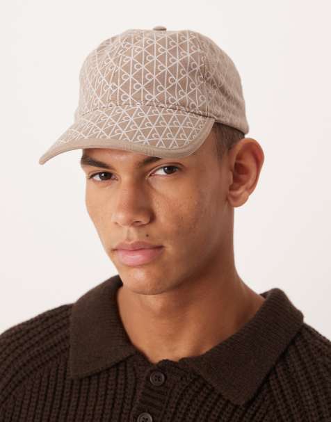 Calvin Klein - Gråbrun kasket med gennemgående emblemprint - view 1