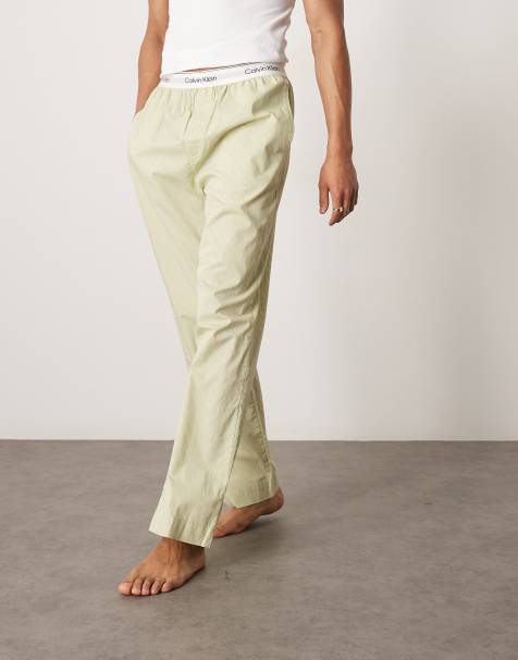 Calvin Klein – Gröna pyjamasbyxor i bomull med suddigt monogrammönster - view 1