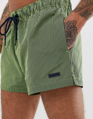 Calvin Klein – Grönrandiga badshorts med logga
