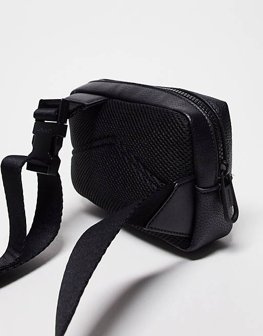 Calvin Klein harness bag in black | ASOS