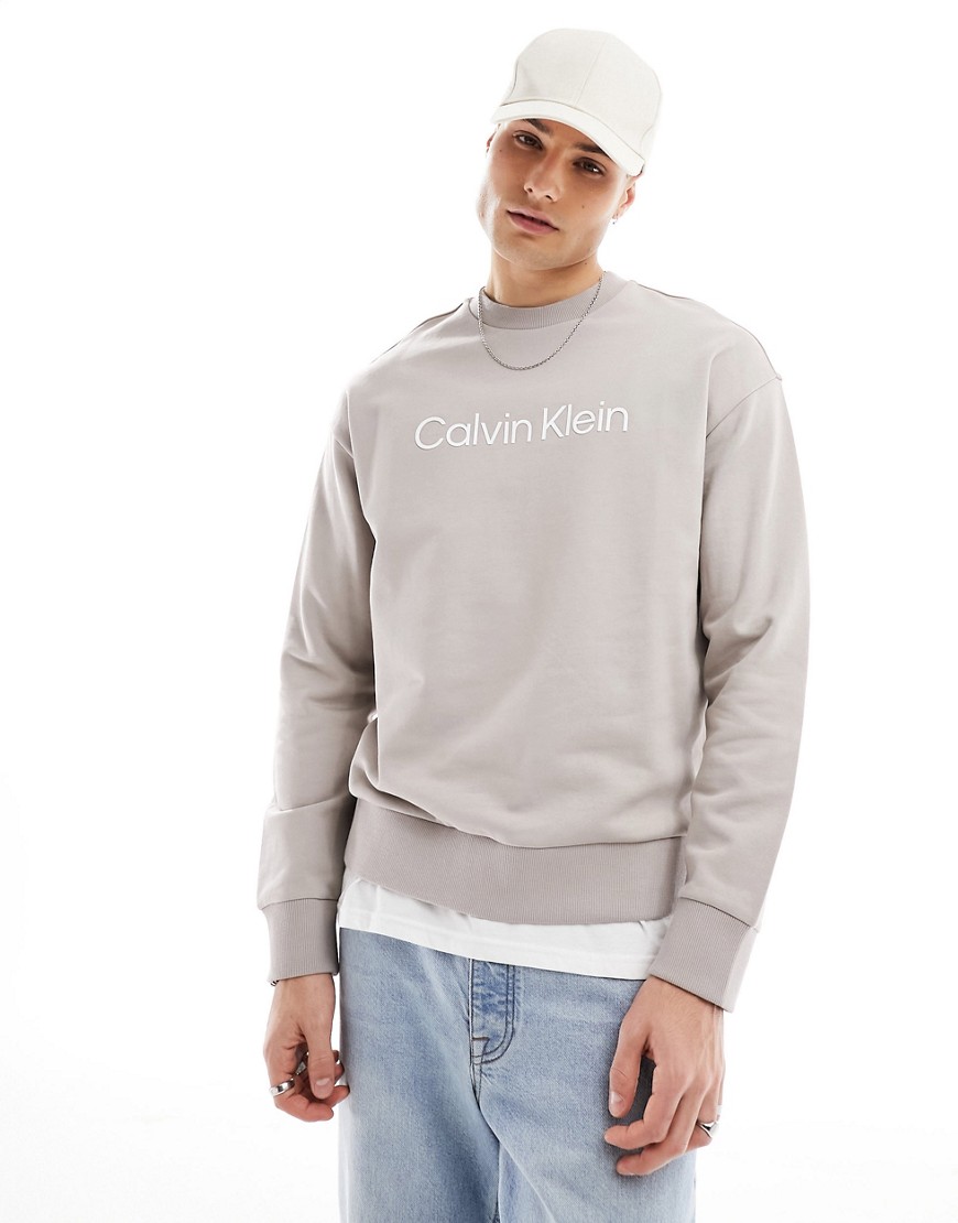 Calvin Klein hero logo comfort sweatshirt in beige-Neutral