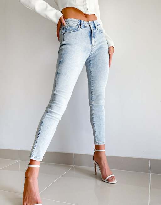 Calvin Klein mid rise skinny jeans in white