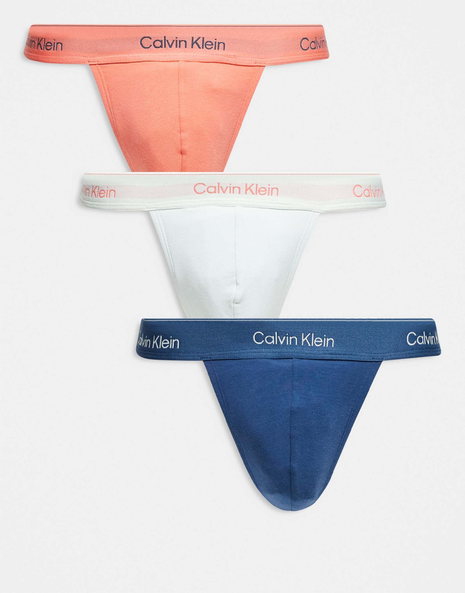 Эластичные хлопковые стринги Calvin Klein Icon из 3-х упаковок синего/кораллового/белого цвета