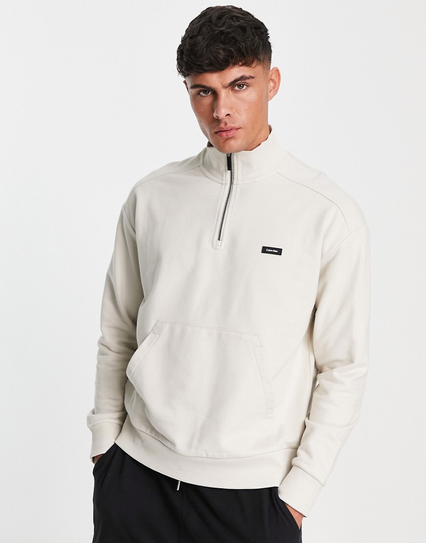 Calvin Klein icon logo comfort cotton blend half zip sweatshirt in stone-Neutral