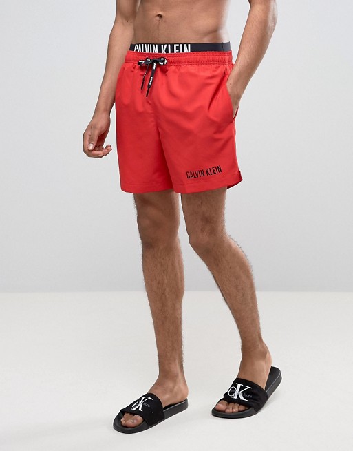 Шорты calvin. Calvin Klein Swim shorts Red. Calvin Klein shorts Red. Плавательные шорты Calvin Klein. Бордшорты Кельвин Кляйн.