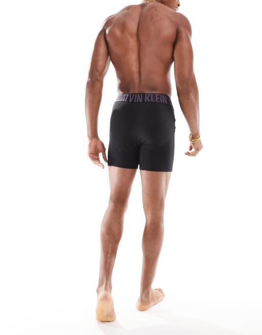 Calvin Klein – Intense Power – 2er-Pack eng geschnittene Boxershorts in Schwarz mit farbigem Logo-Bund, 4 von 4