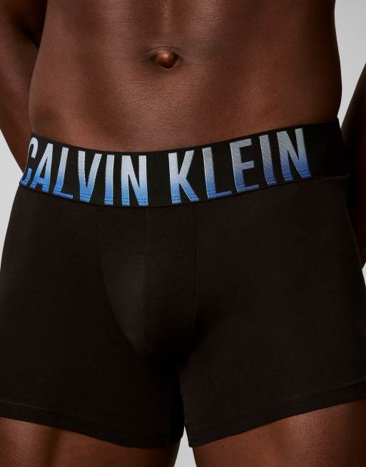 Calvin Klein Intense Power Cotton 3 pack trunks in black with blue/orange logo, 2 of 3