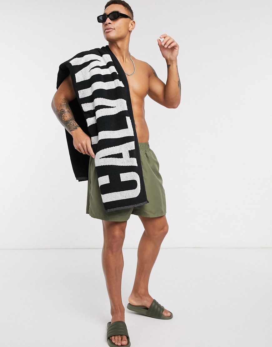 Calvin Klein Intense Power logo beach towel in black