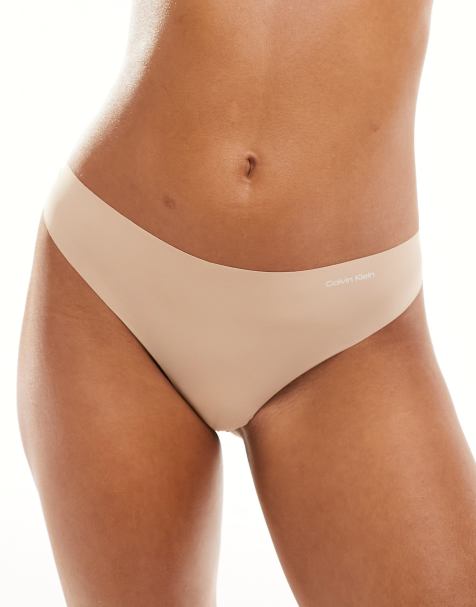 Calvin Klein – Invisibles – Sich nicht abzeichnender Micro-Tanga in Beige - view 1