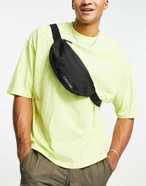 Calvin Klein Item fanny pack in black | ASOS