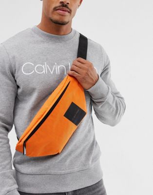 Calvin Klein - Item Story - Heuptasje met logo in oranje