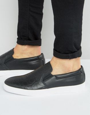 calvin klein black slip on sneakers
