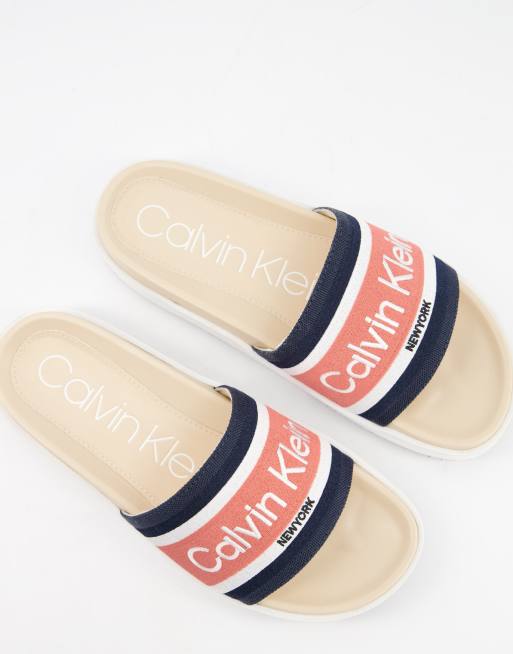 Calvin Klein jaimee flatform sole logo sliders in pink ASOS