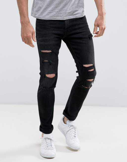 Jean skinny noir déchiré sale