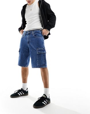 Calvin Klein Jeans 90s loose cargo denim shorts in mid wash