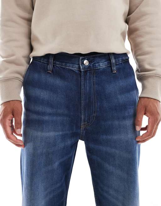 Calvin Klein Jeans 90's tapered jeans in dark wash, 5 of 5