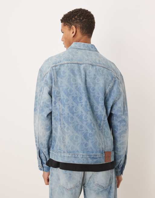 Calvin Klein Jeans all over logo denim trucker jacket co-ord in light wash blue, 3 of 5