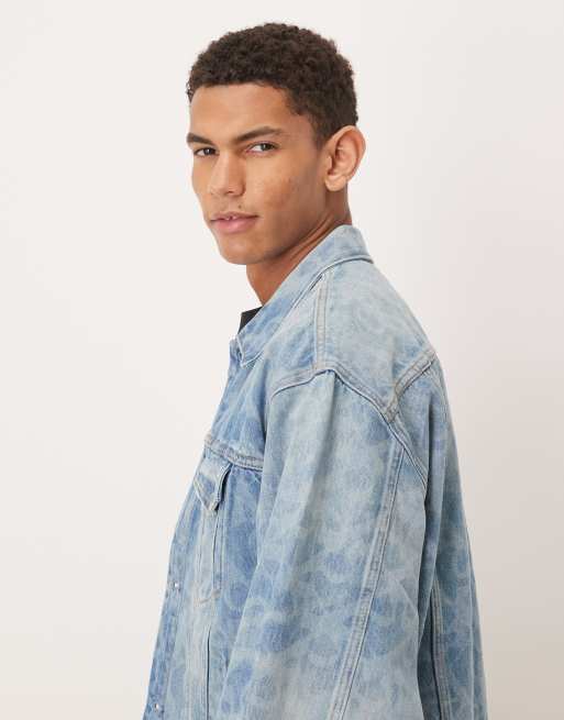 Calvin Klein Jeans all over logo denim trucker jacket co-ord in light wash blue, 4 of 5