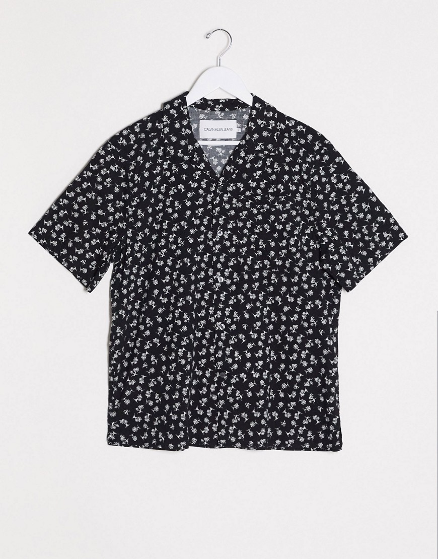 Calvin Klein Jeans all over palm print short sleeve shirt in black