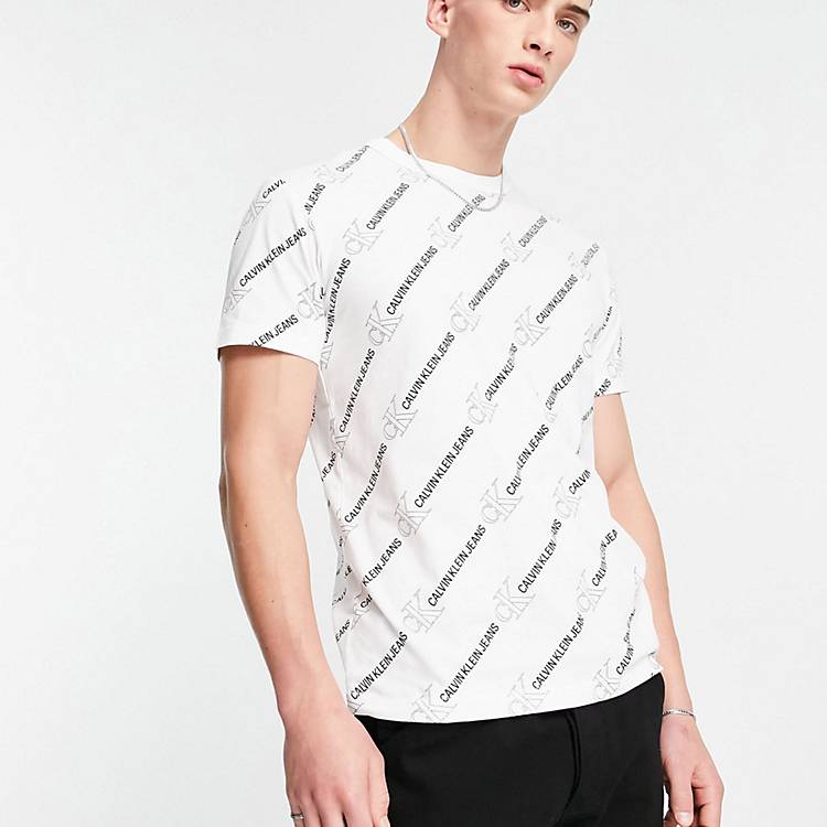 Calvin Klein Jeans all over print logo t-shirt in white | ASOS