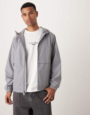 Calvin Klein Jeans Est.1978 All Over Print Nylon Windbreaker Jacket In Silver