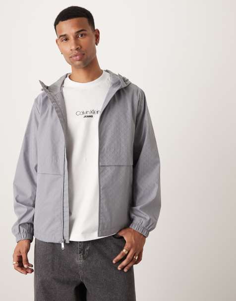 Calvin Klein Jeans all over print nylon windbreaker jacket in grey - view 1