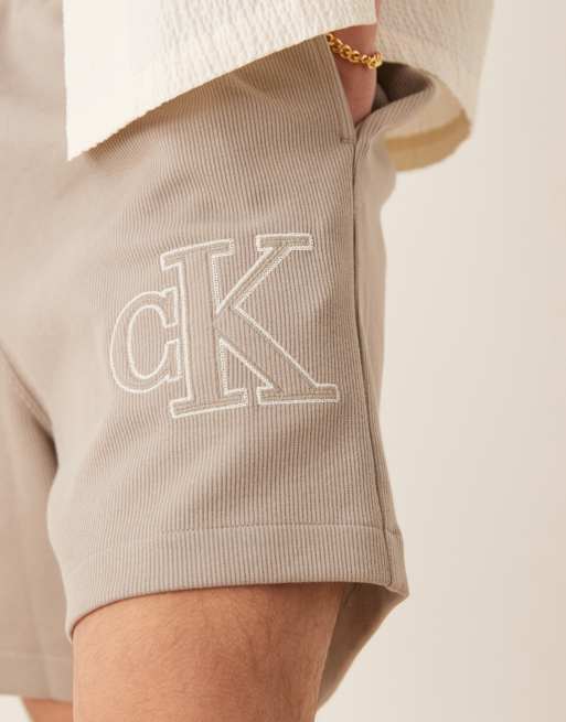 Calvin Klein Jeans applique logo jersey shorts in beige, 4 of 5
